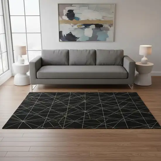 Black And Ivory Geometric Washable Area Rug With UV Protection Photo 2