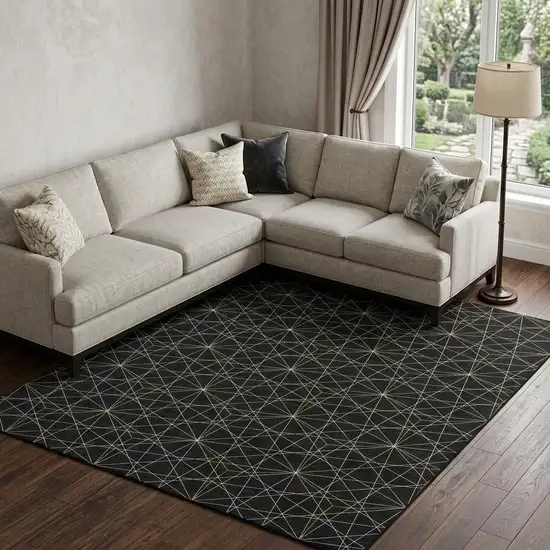 Black And Ivory Geometric Washable Area Rug With UV Protection Photo 1