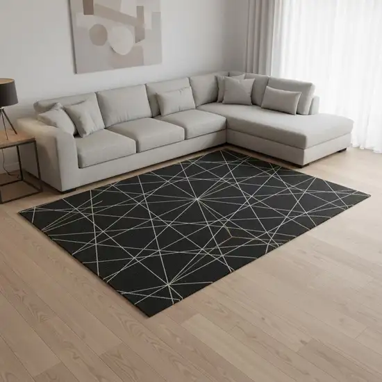 Black And Ivory Geometric Washable Area Rug With UV Protection Photo 2