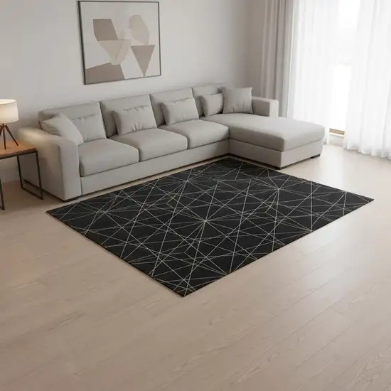 Black And Ivory Geometric Washable Area Rug With UV Protection Photo 2