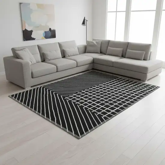 Black And Ivory Geometric Washable Area Rug With UV Protection Photo 2