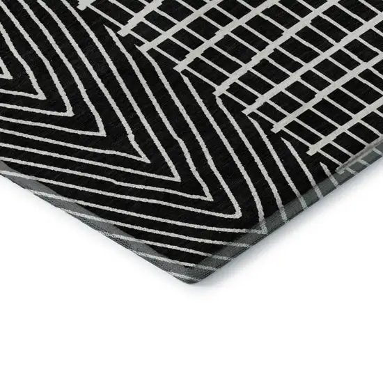 Black And Ivory Geometric Washable Area Rug With UV Protection Photo 1