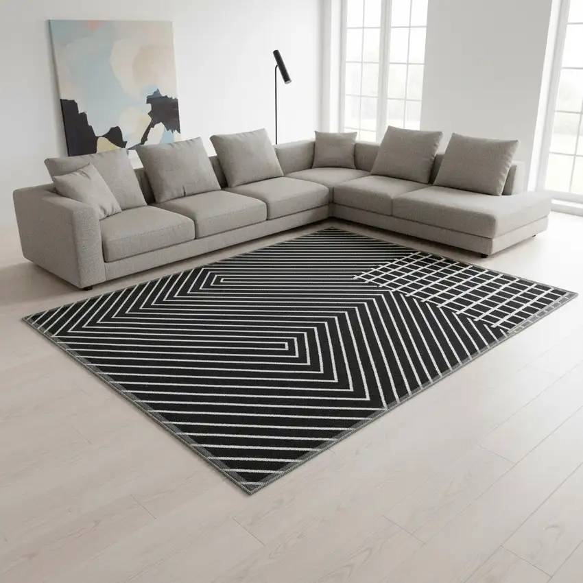 Black And Ivory Geometric Washable Area Rug With UV Protection Photo 2