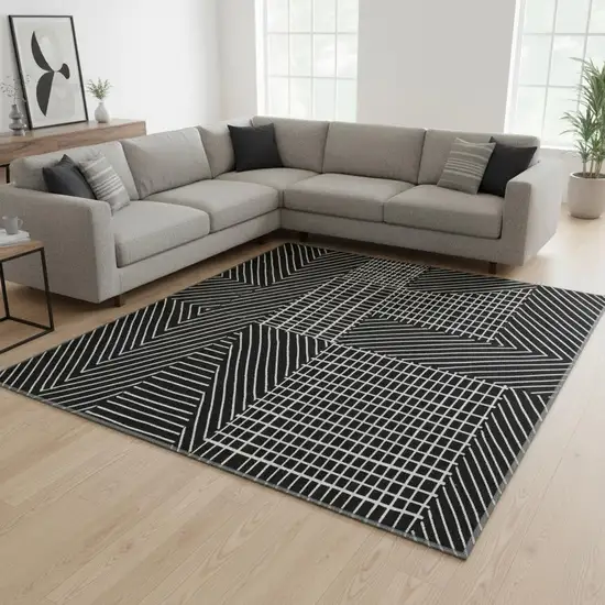 Black And Ivory Geometric Washable Area Rug With UV Protection Photo 2