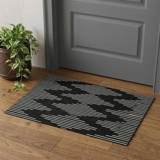 Black And Ivory Geometric Washable Area Rug With UV Protection Photo 1