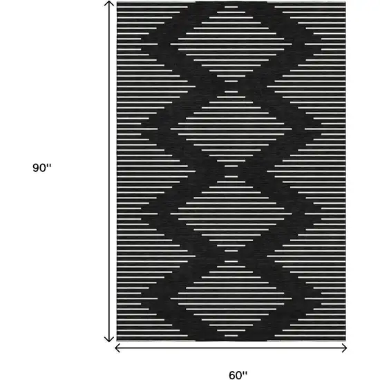 Black And Ivory Geometric Washable Area Rug With UV Protection Photo 7