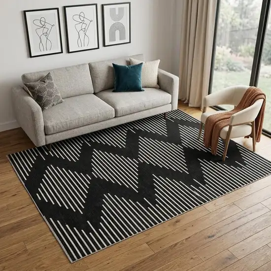 Black And Ivory Geometric Washable Area Rug With UV Protection Photo 1