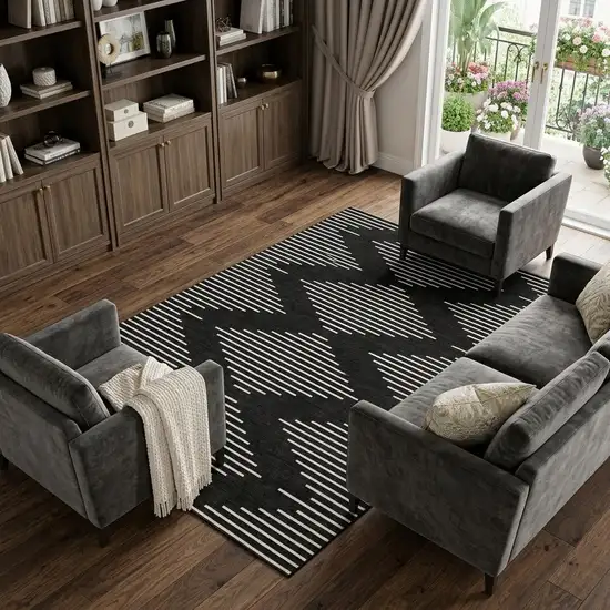 Black And Ivory Geometric Washable Area Rug With UV Protection Photo 1