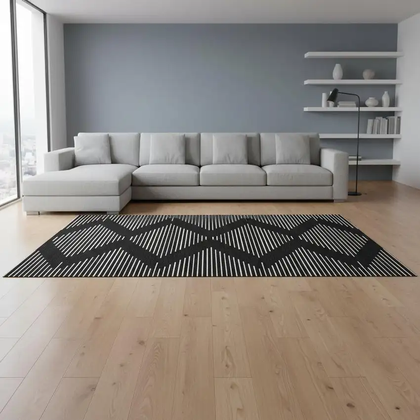 Black And Ivory Geometric Washable Area Rug With UV Protection Photo 2