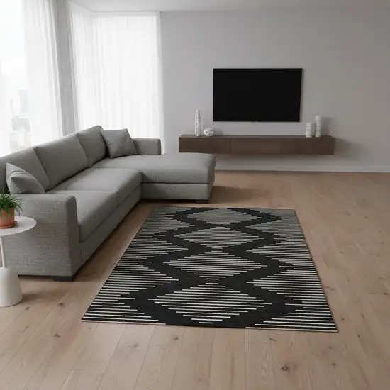 Black And Ivory Geometric Washable Area Rug With UV Protection Photo 2