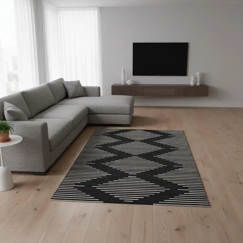 Black And Ivory Geometric Washable Area Rug With UV Protection Photo 2