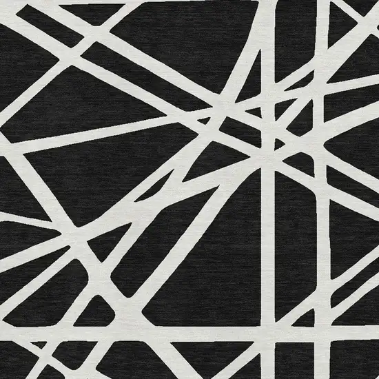 Black And Ivory Geometric Washable Area Rug With UV Protection Photo 2