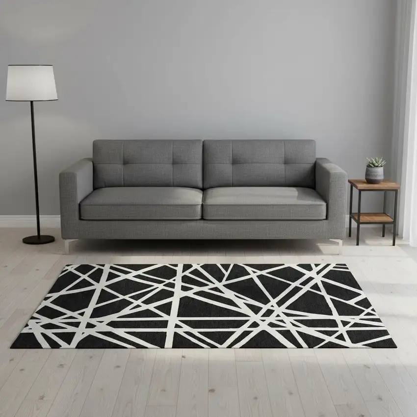 Black And Ivory Geometric Washable Area Rug With UV Protection Photo 2