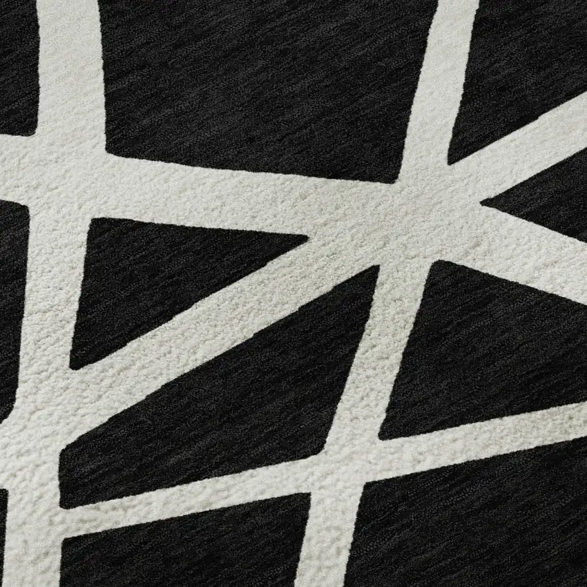 Black And Ivory Geometric Washable Area Rug With UV Protection Photo 9