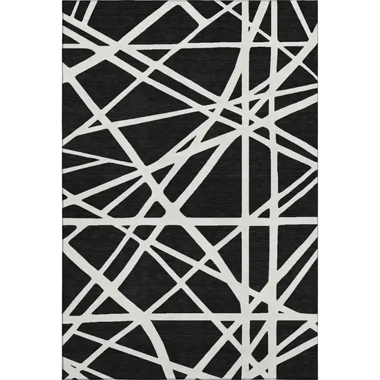 Black And Ivory Geometric Washable Area Rug With UV Protection Photo 1