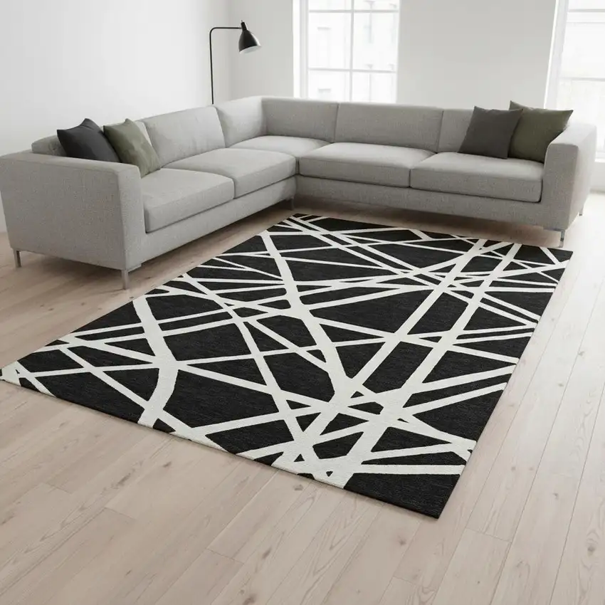 Black And Ivory Geometric Washable Area Rug With UV Protection Photo 2