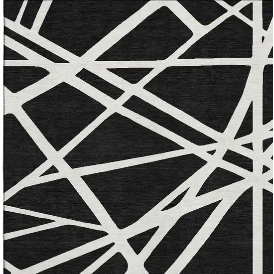 Black And Ivory Geometric Washable Area Rug With UV Protection Photo 2