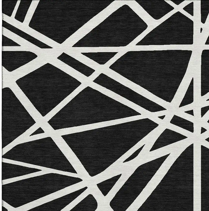 Black And Ivory Geometric Washable Area Rug With UV Protection Photo 2