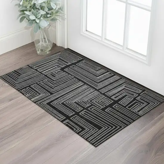 Black And Ivory Geometric Washable Area Rug With UV Protection Photo 2