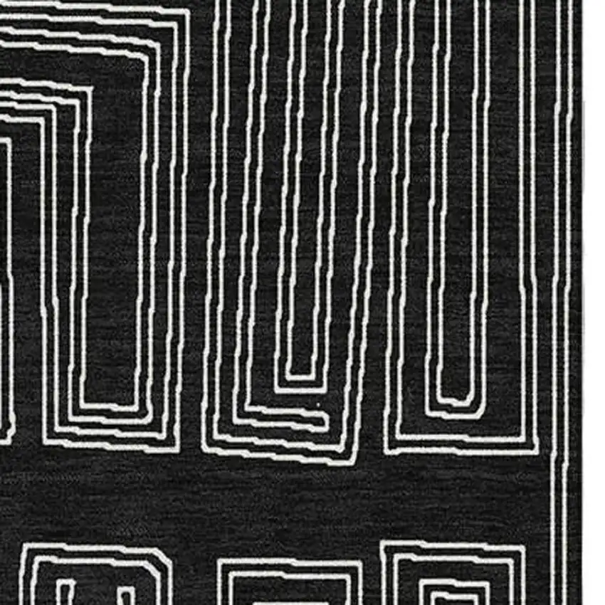 Black And Ivory Geometric Washable Area Rug With UV Protection Photo 2