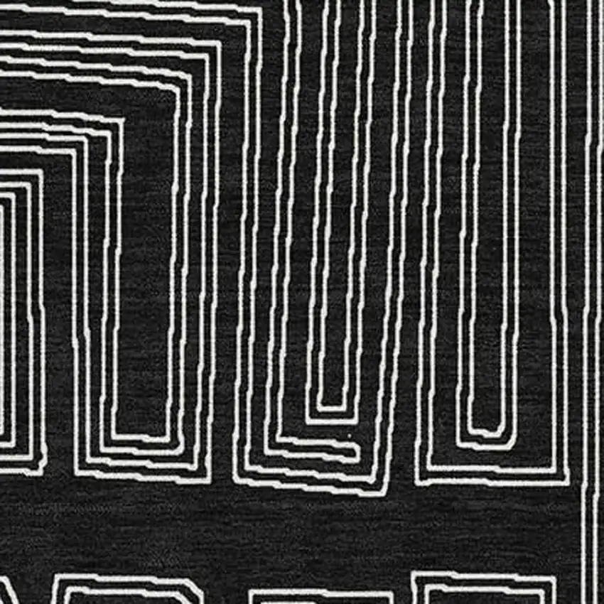 Black And Ivory Geometric Washable Area Rug With UV Protection Photo 2