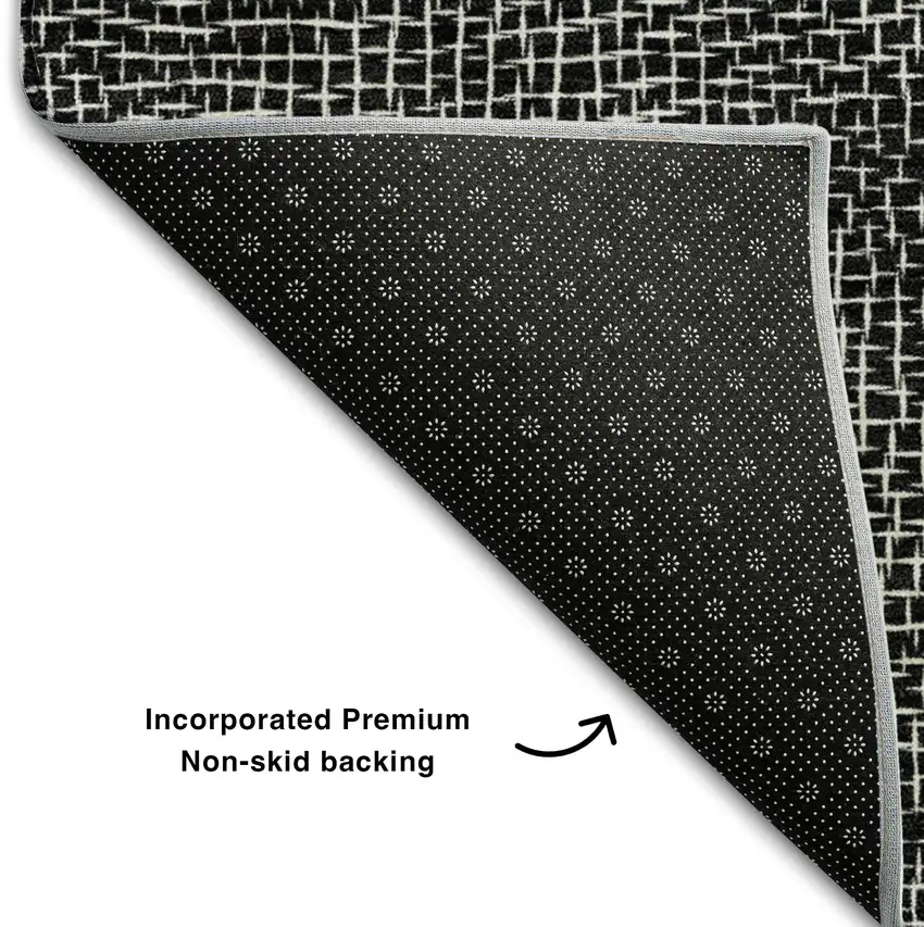 Black And Ivory Geometric Washable Area Rug With UV Protection Photo 6