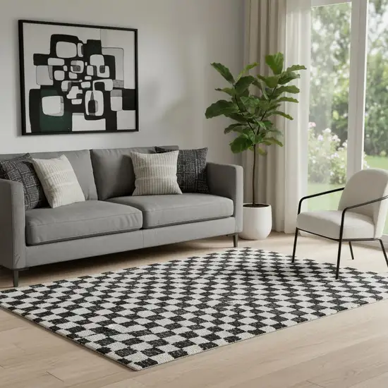 Black And Ivory Geometric Washable Area Rug With UV Protection Photo 2