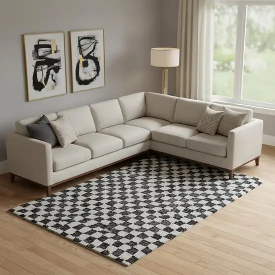 Black And Ivory Geometric Washable Area Rug With UV Protection Photo 2