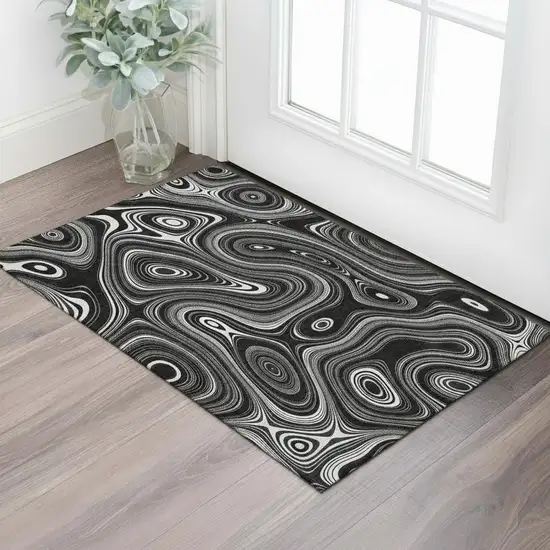 Black And Ivory Geometric Washable Area Rug With UV Protection Photo 2