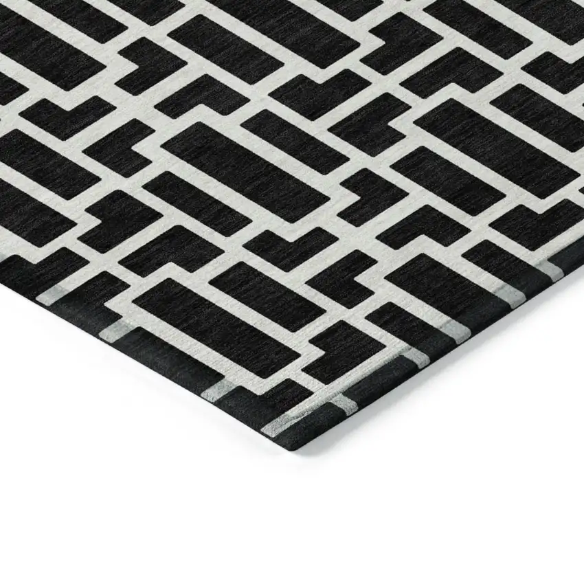 Black And Ivory Geometric Washable Indoor Outdoor Area Rug Photo 5