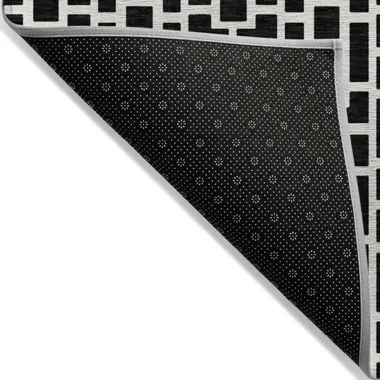 Black And Ivory Geometric Washable Indoor Outdoor Area Rug Photo 4