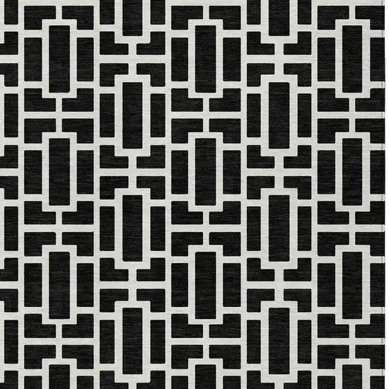 Black And Ivory Geometric Washable Indoor Outdoor Area Rug Photo 7