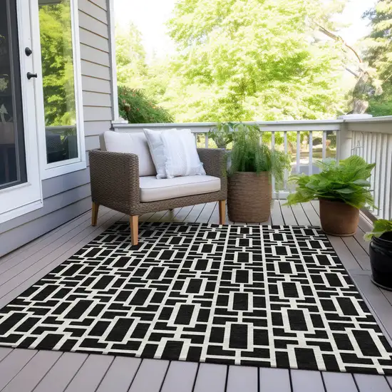 Black And Ivory Geometric Washable Indoor Outdoor Area Rug Photo 9