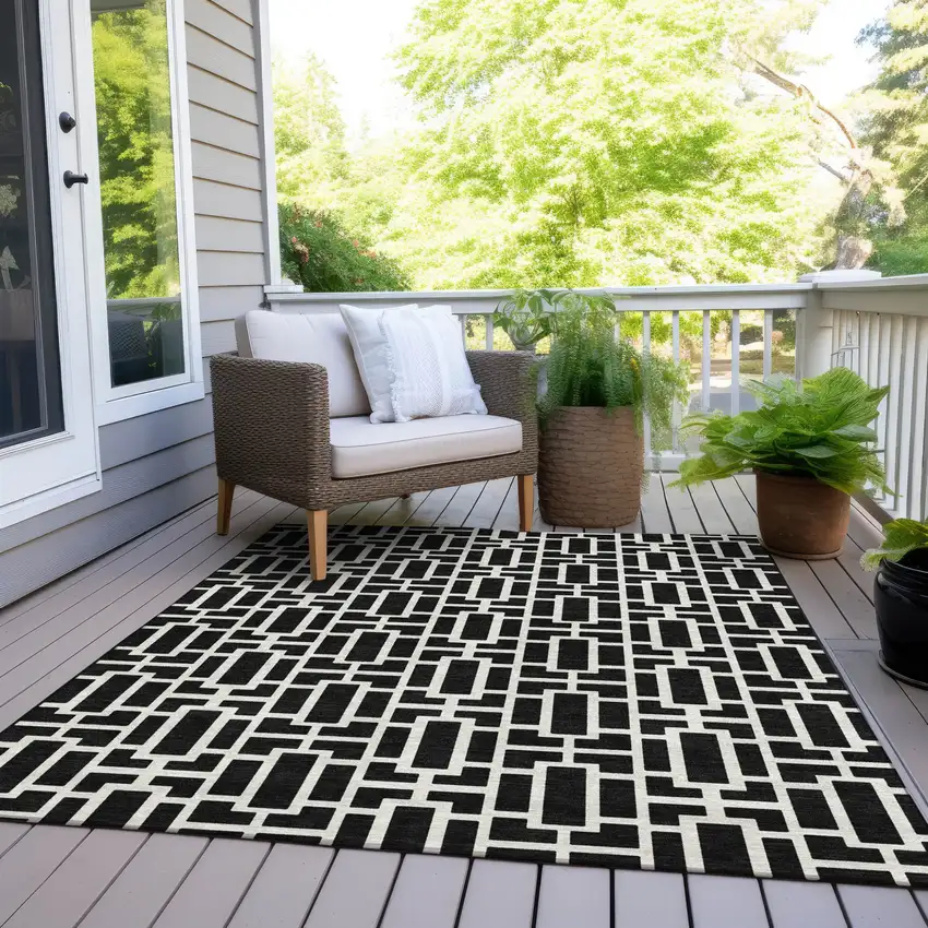 Black And Ivory Geometric Washable Indoor Outdoor Area Rug Photo 9