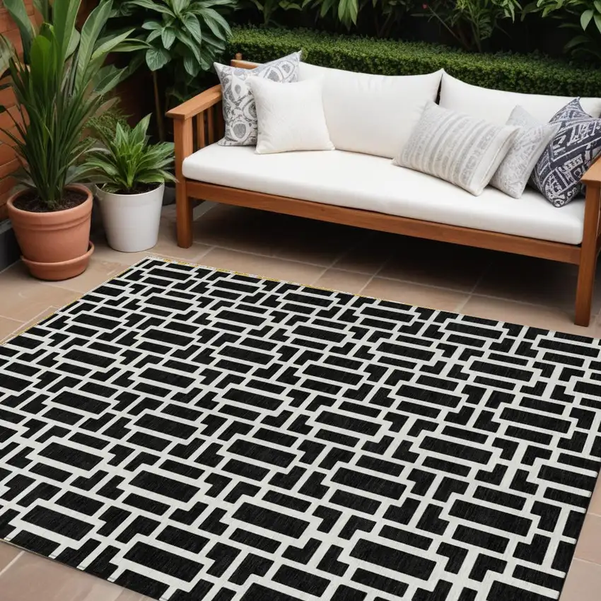 Black And Ivory Geometric Washable Indoor Outdoor Area Rug Photo 1