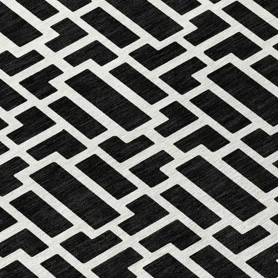 Black And Ivory Geometric Washable Indoor Outdoor Area Rug Photo 6