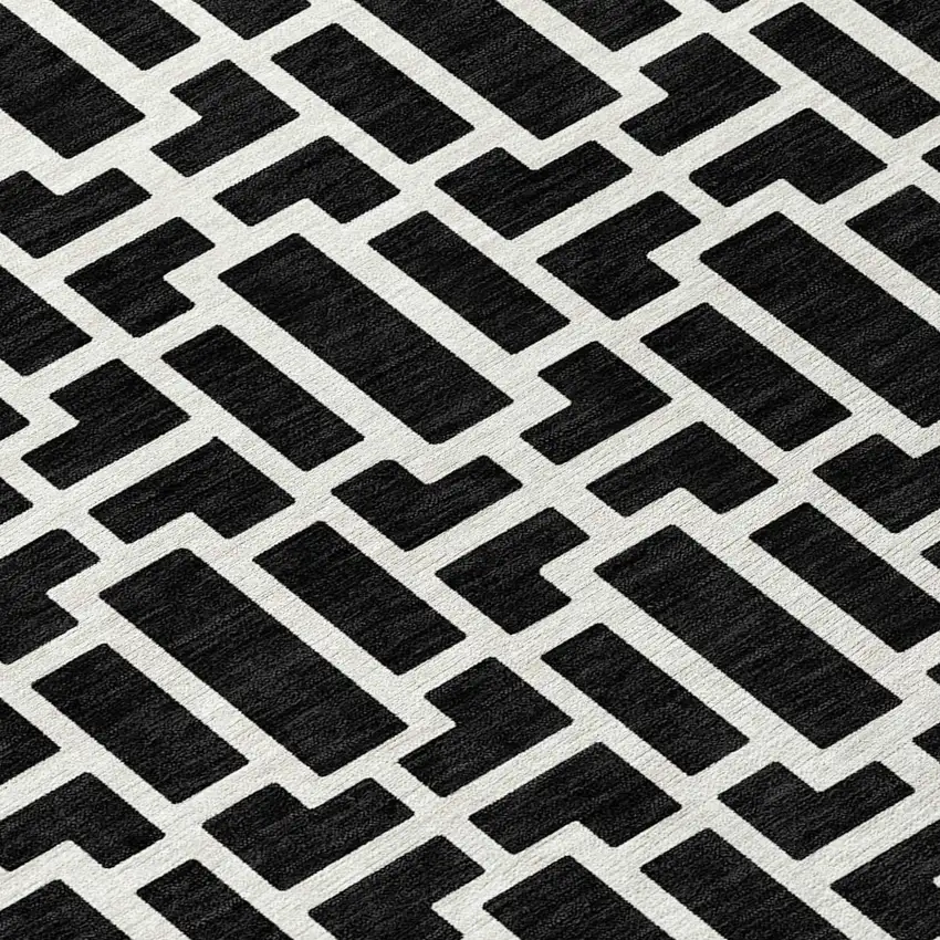 Black And Ivory Geometric Washable Indoor Outdoor Area Rug Photo 6