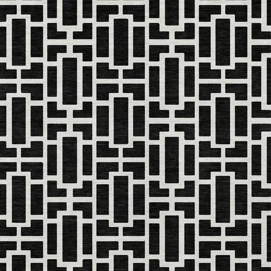 Black And Ivory Geometric Washable Indoor Outdoor Area Rug Photo 7