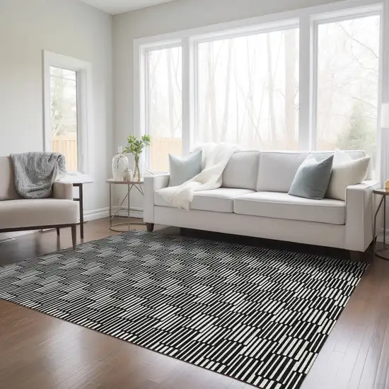 Black And Ivory Geometric Washable Indoor Outdoor Area Rug Photo 9