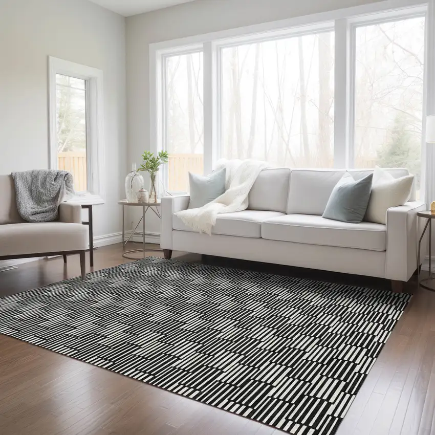 Black And Ivory Geometric Washable Indoor Outdoor Area Rug Photo 9