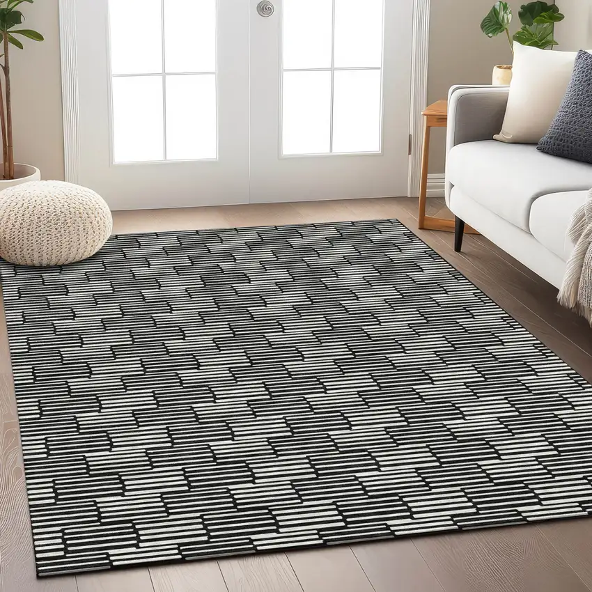 Black And Ivory Geometric Washable Indoor Outdoor Area Rug Photo 9