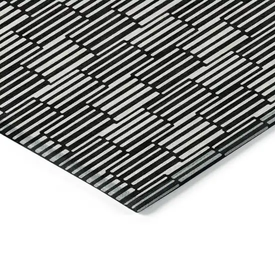 Black And Ivory Geometric Washable Indoor Outdoor Area Rug Photo 5
