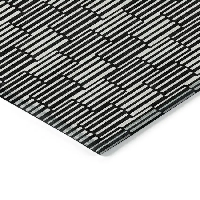 Black And Ivory Geometric Washable Indoor Outdoor Area Rug Photo 5