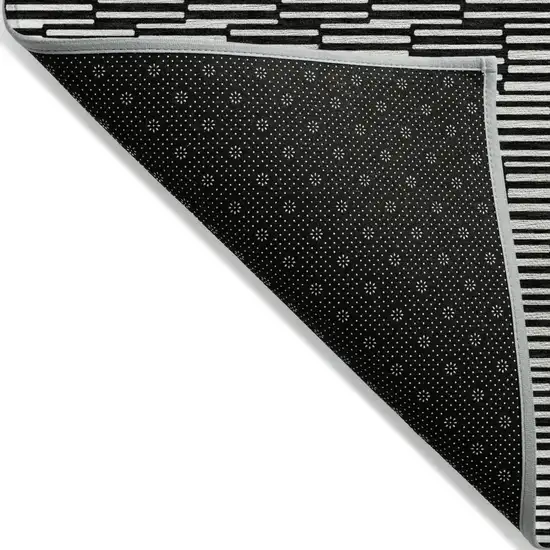 Black And Ivory Geometric Washable Indoor Outdoor Area Rug Photo 4
