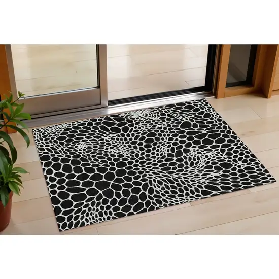 Black And Ivory Geometric Washable Indoor Outdoor Area Rug Photo 1
