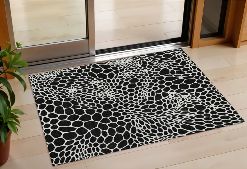 Black And Ivory Geometric Washable Indoor Outdoor Area Rug Photo 1