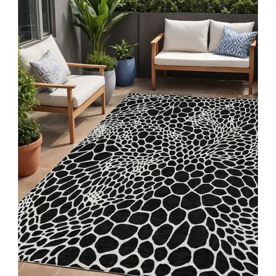 Black And Ivory Geometric Washable Indoor Outdoor Area Rug Photo 1