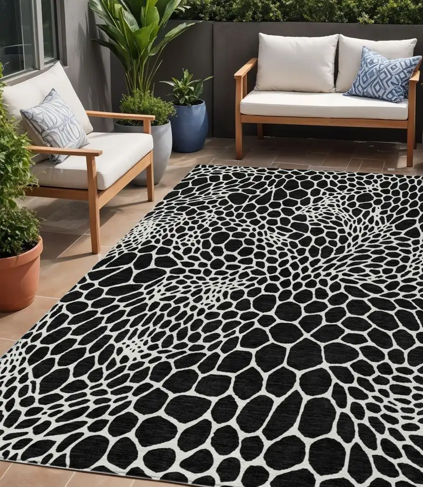 Black And Ivory Geometric Washable Indoor Outdoor Area Rug Photo 1