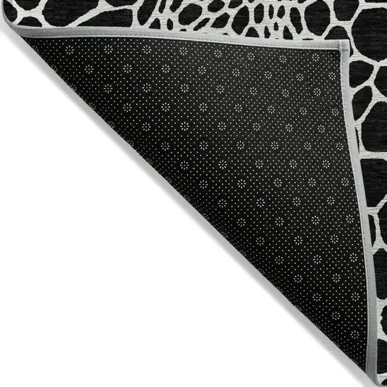 Black And Ivory Geometric Washable Indoor Outdoor Area Rug Photo 4
