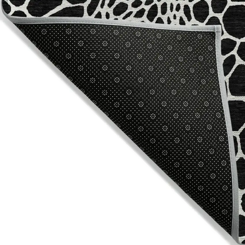 Black And Ivory Geometric Washable Indoor Outdoor Area Rug Photo 4